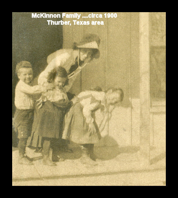 Three McKinnon Children on a porch